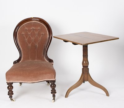 Lot 632 - A Victorian button back chair on turned legs...