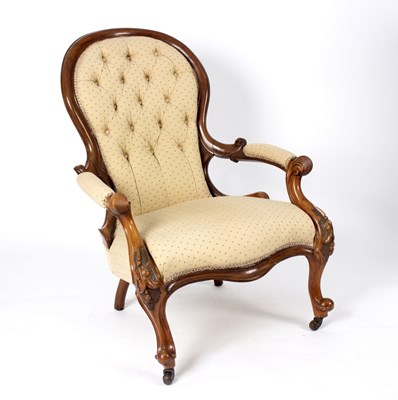 Lot 638 - A Victorian walnut armchair with padded scroll...