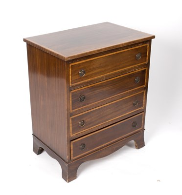 Lot 655 - An Edwardian mahogany chest of four drawers,...