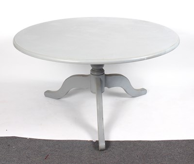 Lot 674 - A grey painted circular table on a turned...