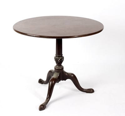 Lot 704 - A George III tilt-top supper table, on a...