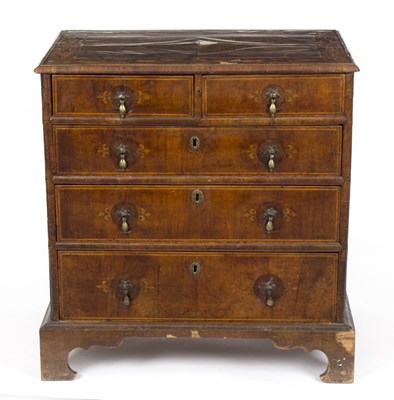 Lot 713 - An 18th Century walnut chest of two short over...