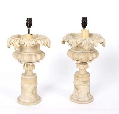 Lot 758 - A pair of alabaster urns mounted as lamps,...