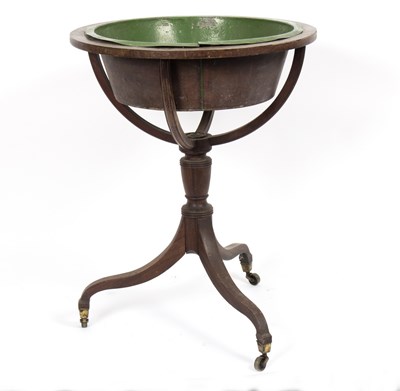 Lot 795 - A Regency mahogany globe stand, on a turned...