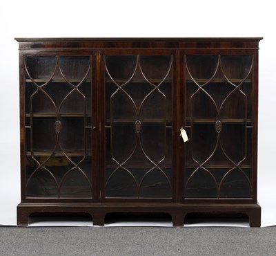 Lot 801 - An Edwardian mahogany bookcase, fitted...