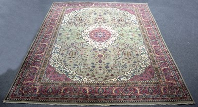 Lot 823 - An Indian carpet, the central medallion to a...