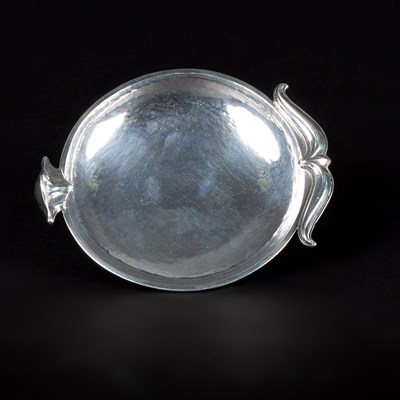 Lot 39 - Omar Ramsden, a silver dish, London 1938 with...