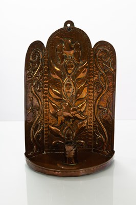 Lot 50 - John Pearson, a copper embossed wall sconce,...