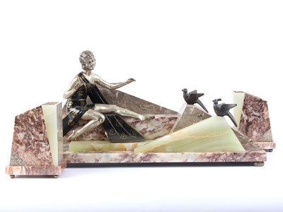 Lot 70 - An Art Deco style spelter, marble and onyx...
