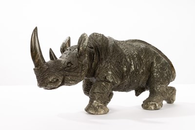 Lot 72 - A Shona stone carving of a rhinoceros, 25cm...