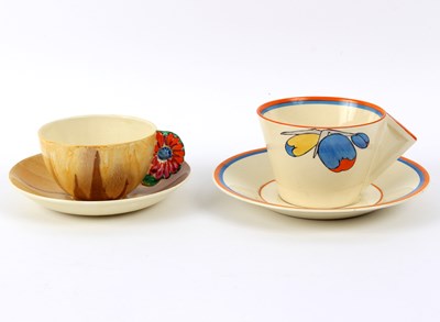 Lot 115 - A Clarice Cliff Bizarre cup and saucer, flower...