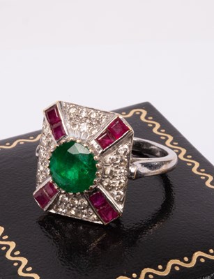 Lot 95 - An 18ct white gold, emerald, ruby and diamond ring