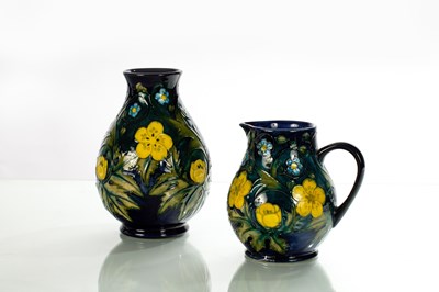 Lot 148 - Moorcroft, a Buttercup pattern baluster vase,...