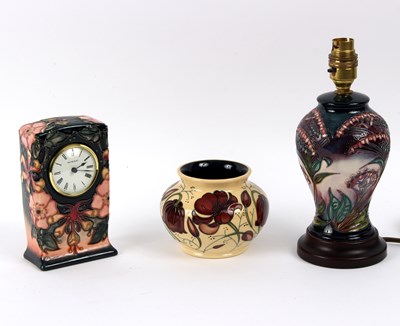 Lot 149 - Moorcroft, a Honeysuckle pattern mantel clock,...