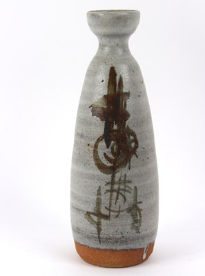 Lot 196 - A baluster stoneware vase of grey ribbed glaze...