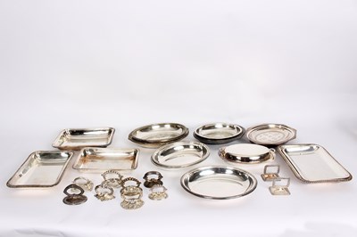 Lot 4 - A collection of plated entree dishes and covers