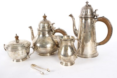 Lot 21 - A silver four-piece tea set, William Comyns &...