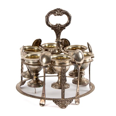 Lot 22 - A George IV silver six cup egg cruet, William...