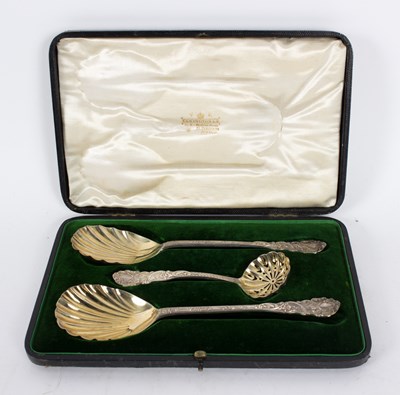 Lot 23 - A pair of silver serving spoons, George...