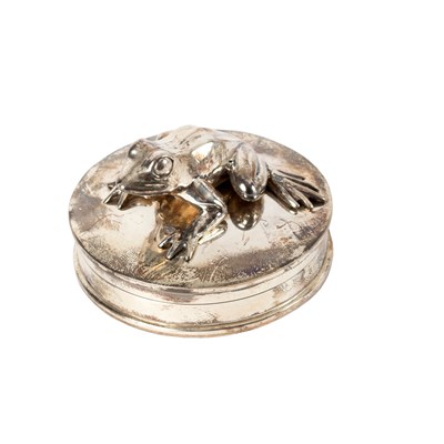 Lot 29 - A circular silver box with frog to the cover,...