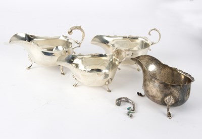 Lot 46 - Three silver sauce boats and another (damaged),...