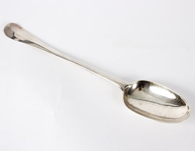Lot 100 - A George I silver basting spoon, London 1724,...