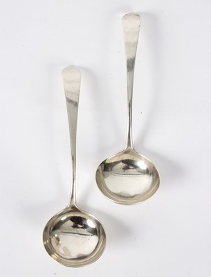 Lot 102 - A pair of George III silver sauce ladles,...