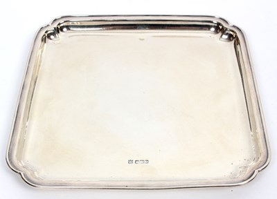 Lot 116 - A square silver waiter, Sheffield 1924, with...