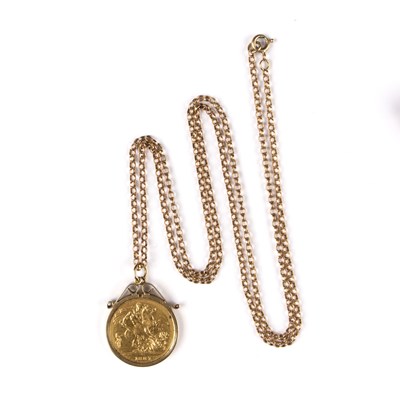 Lot 134 - A 1887 gold sovereign on a 9ct gold chain,...