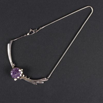 Lot 151 - A silver and amethyst modernist necklace, set...