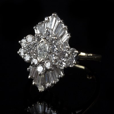 Lot 160 - A diamond cluster ring, the central navette...