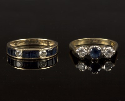 Lot 168 - A sapphire and diamond half eternity ring to...