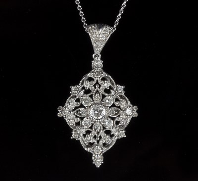 Lot 169 - A diamond pendant of pierced foliate design to...