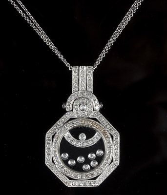 Lot 170 - A diamond pendant, in the manner of Chopard...