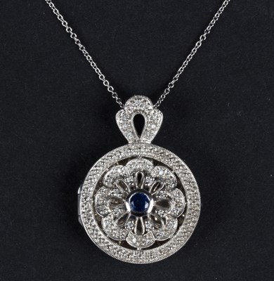 Lot 176 - A sapphire and diamond locket pendant, the...