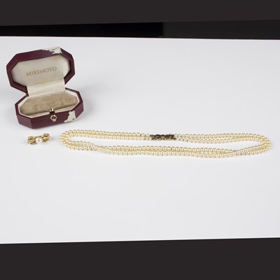 Lot 195 - A Mikimoto two-strand cultured pearl necklace...