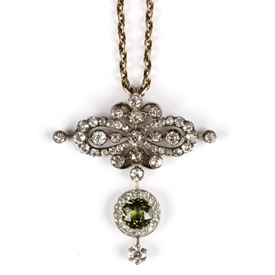 Lot 213 - A Victorian green sapphire and diamond pendant...