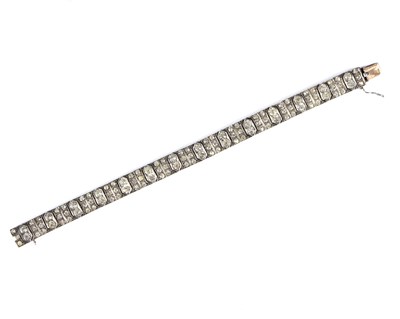 Lot 215 - A white metal paste bracelet, stamped 9ct to...