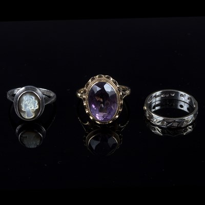 Lot 221 - An oval amethyst dress ring in 9ct gold, size...