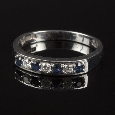 Lot 228 - A sapphire and diamond seven-stone ring, the...