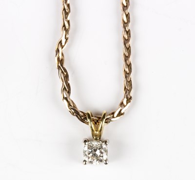 Lot 232 - A diamond single stone pendant, the stone of...