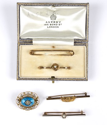 Lot 238 - A gem set bar brooch the central pearl flanked...