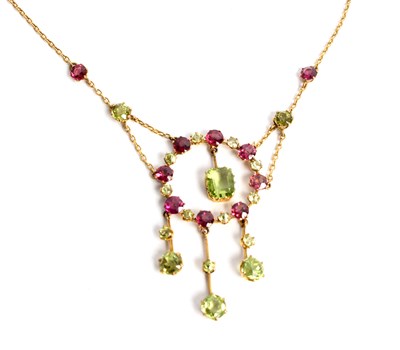 Lot 241 - An amethyst and peridot necklace, the central...