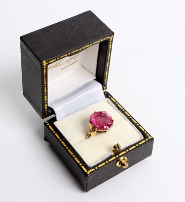 Lot 242 - A pink tourmaline single stone ring, the large...