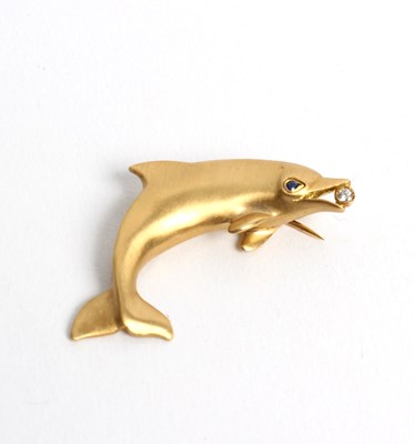 Lot 246 - An 18ct gold dolphin brooch by Tiffany & Co,...