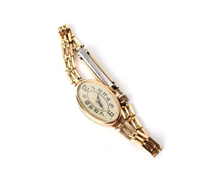 Lot 270 - A lady's 9ct gold cased wristwatch, the oval...