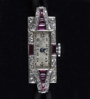 Lot 273 - An Art Deco lady's platinum, diamond and ruby...