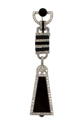Lot 275 - A Cartier 'Egyptian' onyx and diamond lapel...