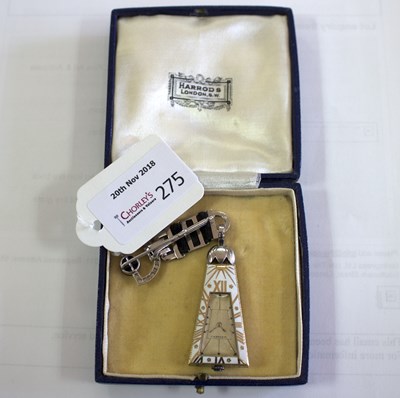 Lot 275 - A Cartier 'Egyptian' onyx and diamond lapel...