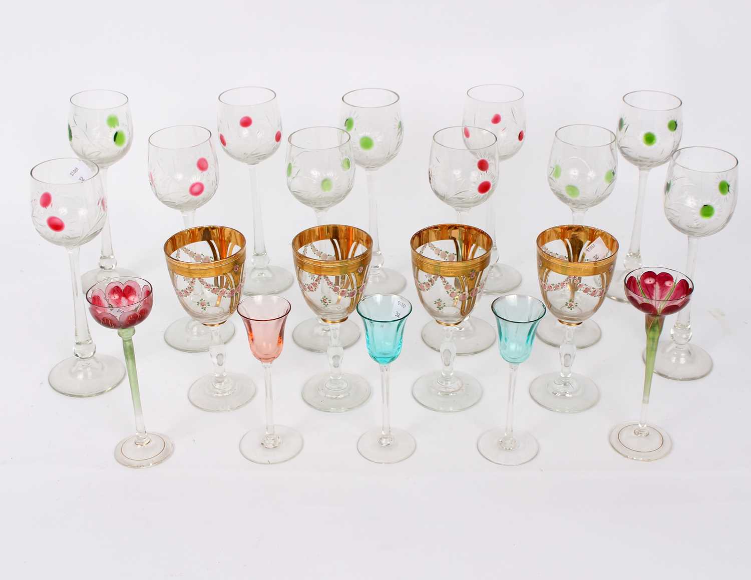 Lot 282 - Ten hock glasses with green and red sunburst...